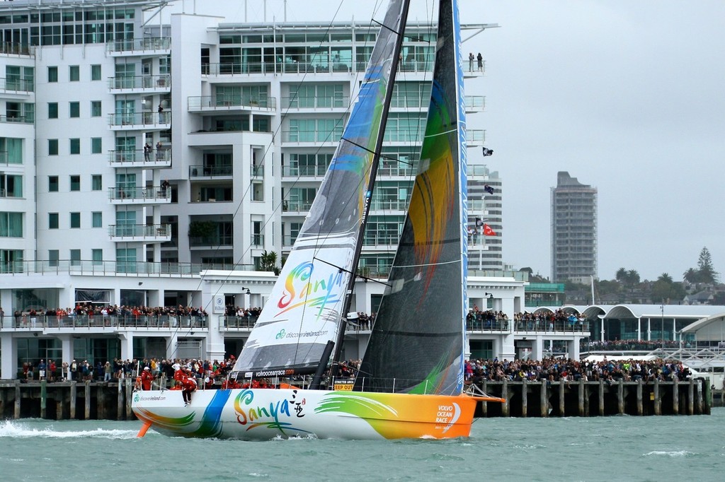 Sanya leads and tacks out of the Auckand wharves, with a big crowd behind her - Volvo Ocean Race Auckland - Start March 18,2012 © Richard Gladwell www.photosport.co.nz